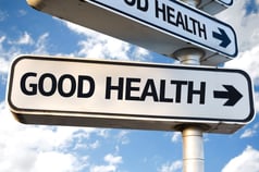 Good Health direction sign on sky background-1