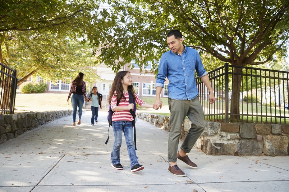 Father picking up daughter from school