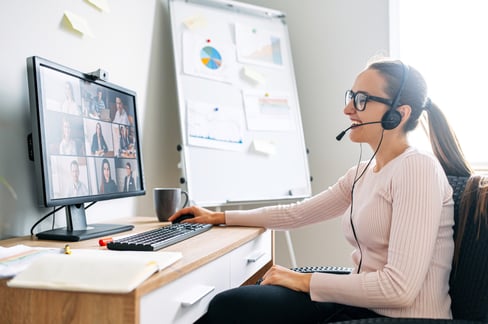 Women wearing headset working from home