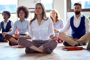 Group of Employees Meditating