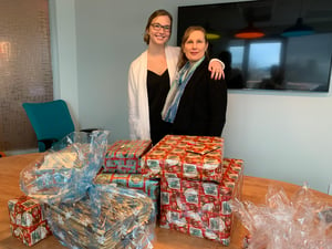 Maddy and Cindy with Gifts for Family