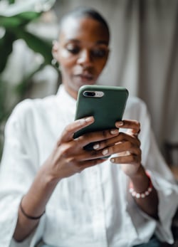 Woman holding smartphone