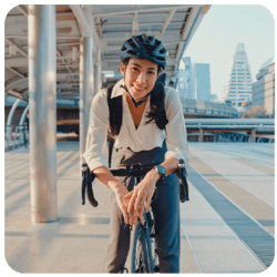 Woman on Bike Going to Work