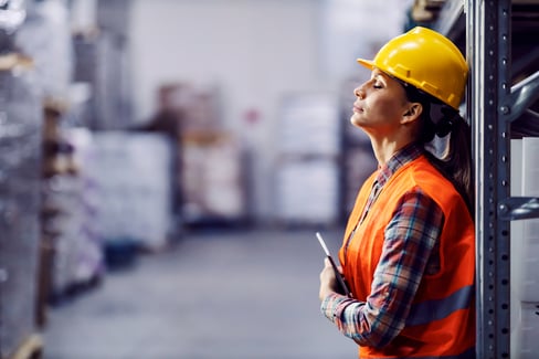 Tired manufacturing employee