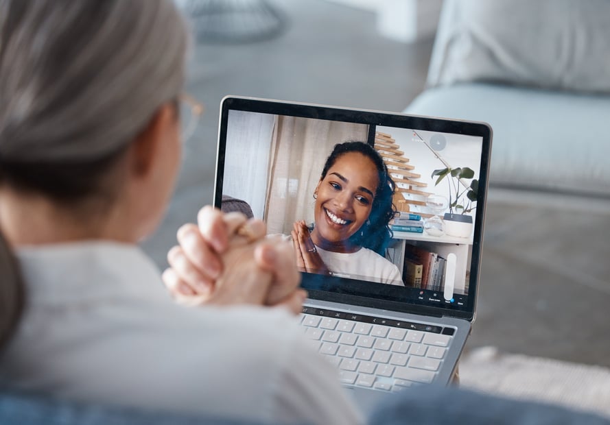 Woman receiving video counselling