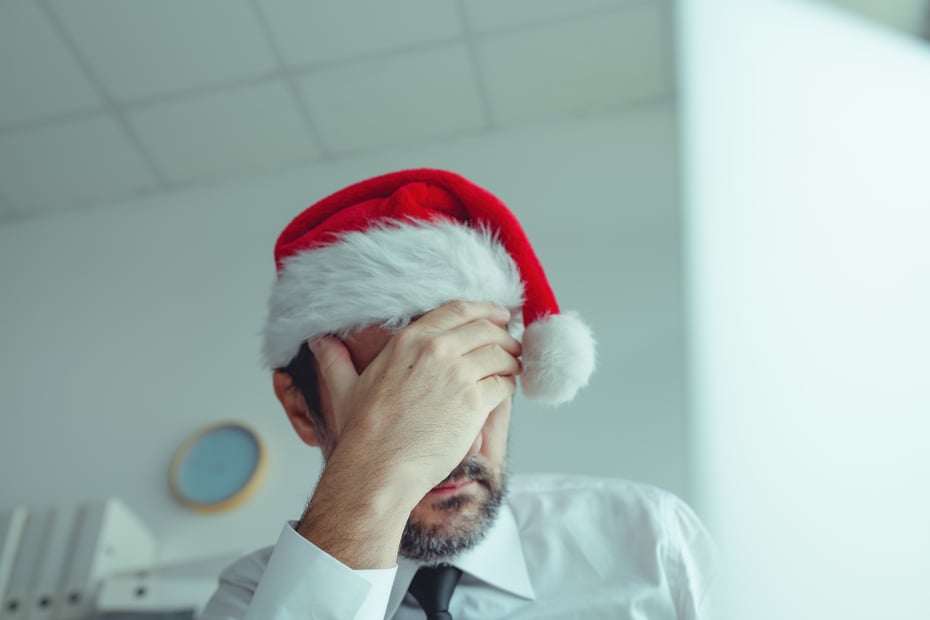 Depressed employee at christmas holiday time