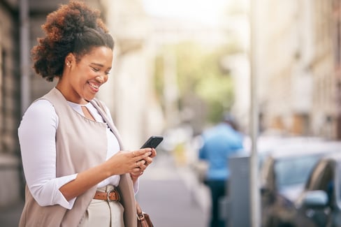 Smiling woman on cell phone