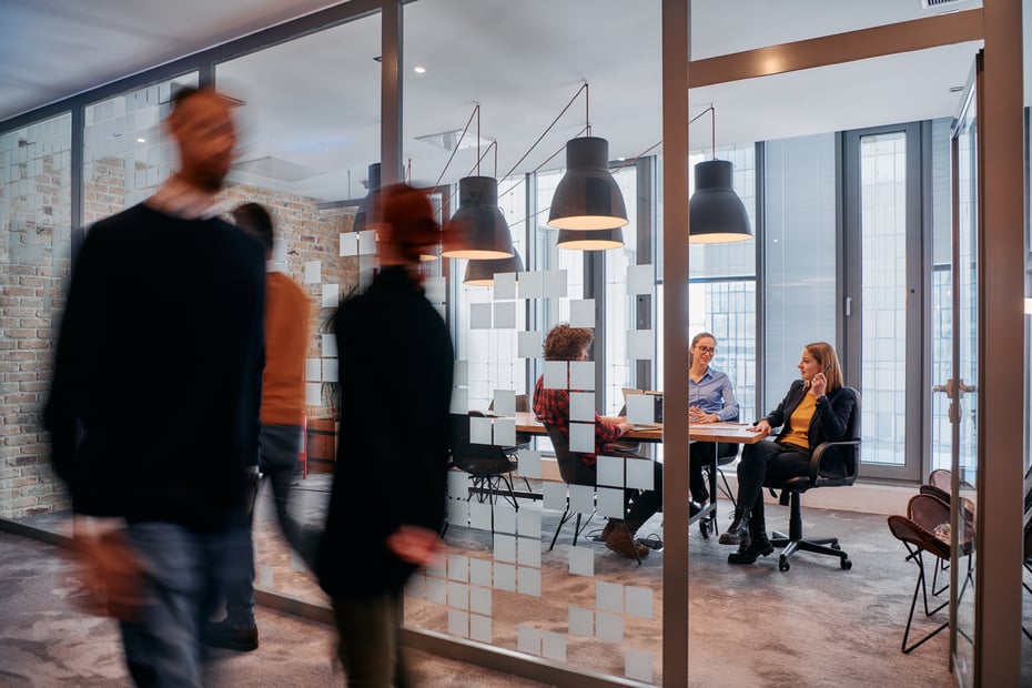 employees walking through an office