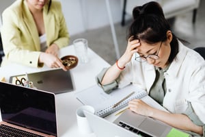 lady at desk stresssed